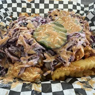 Fries.  Very good.  Fries are substantial enough to stand up to the big chunks of chicken, sauce, &amp; slaw.