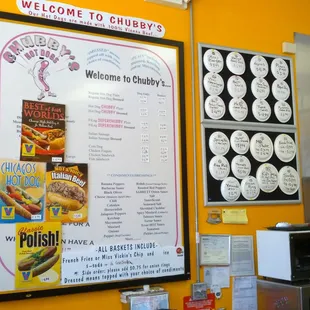 Main menu board on the left -- exotic items on the paper plates to the right