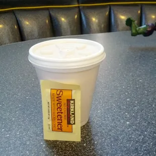 a cup of coffee on a table