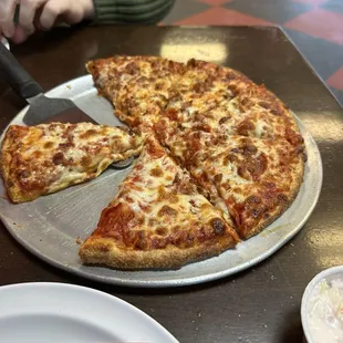 Medium pepperoni and bacon pizza.