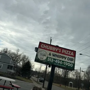 a sign for chubby's pizza