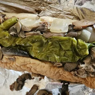 Mushroom Steak with Provolone, American, Grilled Onions and a Long Hot