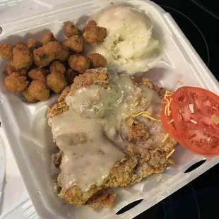 Pork cutlet dinner. Tomatoes was from a separate chef salad. Okra was really good as well as the cutlet