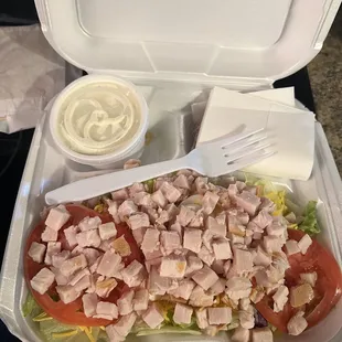 Giant turkey chef salad.  This would be enough for two.