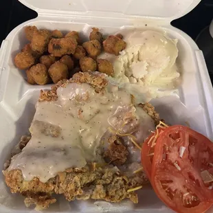 Pork cutlet dinner. Came with Texas toast also (not pictured). I already ate a few bites before the picture.