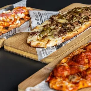 three different types of pizza
