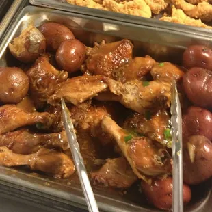 Baked chicken and potatoes on the buffet...special treat