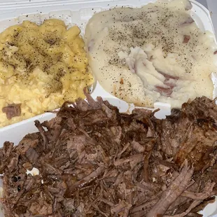 Brisket platter with garlic mashed potatoes and Mac and cheese.