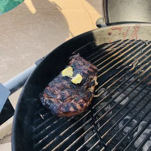 a steak on the grill
