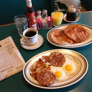 two plates of breakfast food