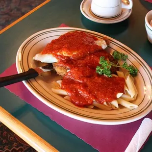 a plate of pasta and sauce
