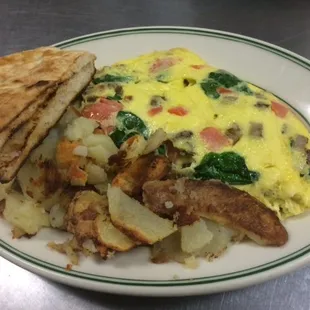 an omelet and potatoes