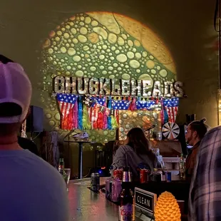 people sitting at a bar