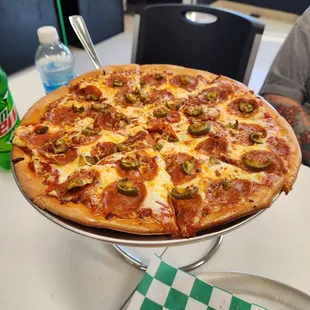Pepperoni and jalapeño pizza