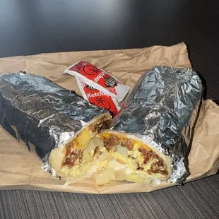 Eggs,potatoes,bacon,cheese,ketchup packets