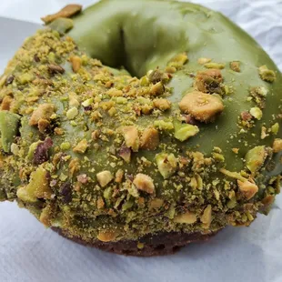 Ube cake w/matcha frosting and pistachios