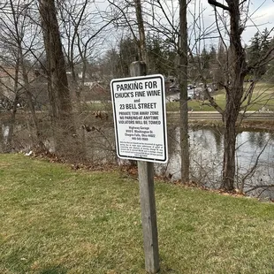 Sign CLEARLY states customers can park here!!!Does not say only parking when on premises!!!