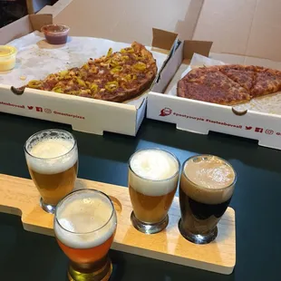 Beer flight and pizza; what better combination is there?  Thank you, Chuck's, for a comp slice!
