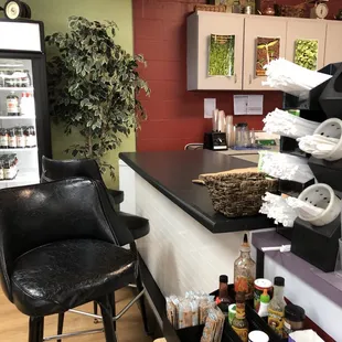 a counter and chairs