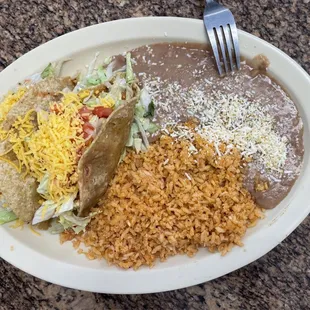 Hard tacos, beans and rice