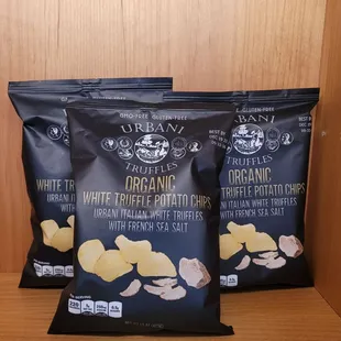 three bags of organic white truffle potato chips