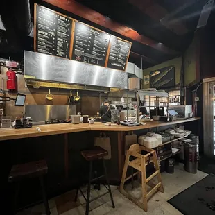 a restaurant counter with menus
