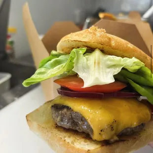 Local grassfed beef patty on local bakery bread with lettuce, tomato, onion and housemade thousand island spread.