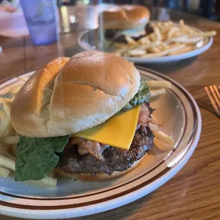 Bacon cheddar burger and mushroom Swiss burger with fries