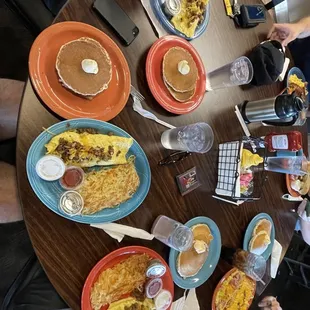 a group of people eating breakfast