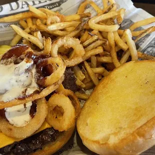 Rodeo burger with American cheese and fries.