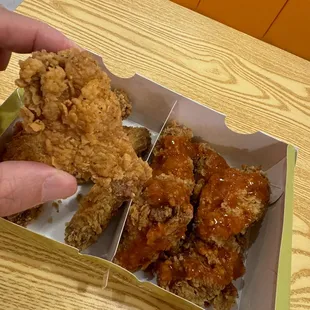 10 saucy wings with 2 flavors sauce