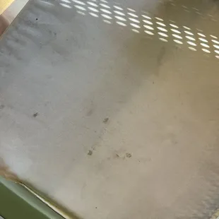 Dirty and stained seat cushion.
