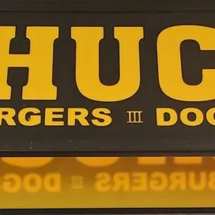 a sign for chuco burgers and dogs