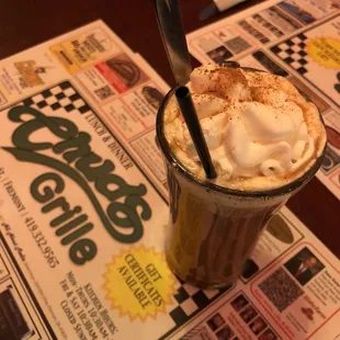 a hot chocolate drink with whipped cream
