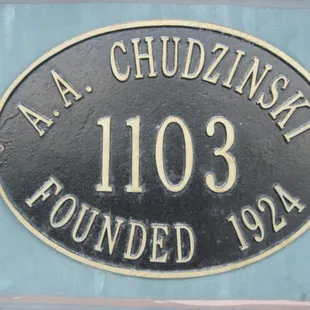 Plaque on the exterior wall of Chud&apos;s Grille.  They&apos;ve been here in Fremont, Ohio, for quite a whie!