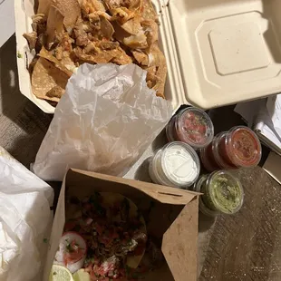 Chicken Asada Nachos, carnitas soft taco &amp; sauces/guac/sour cream on the side as requested. The BRC burrito is oven on &quot;warm&quot; setting.