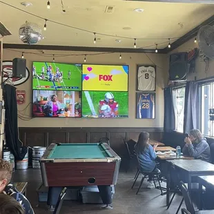a billiards table and a pool table