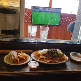 Taco and nachos! Titos and soda
