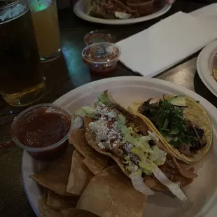 Crispy beef taco and fish taco