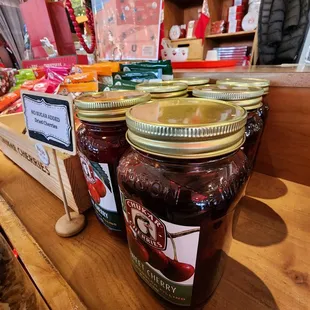 jars of cherries on a table