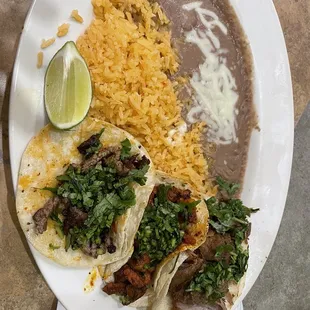3 taco platter. Pastor, asada, and carnitas. Great flavor and the meat wasn&apos;t dry. Tender and delicious!