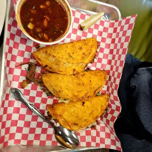 Birria tacos and consume