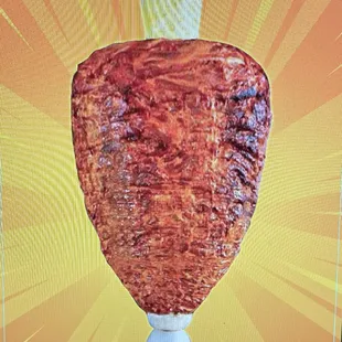 a large piece of meat on a stick