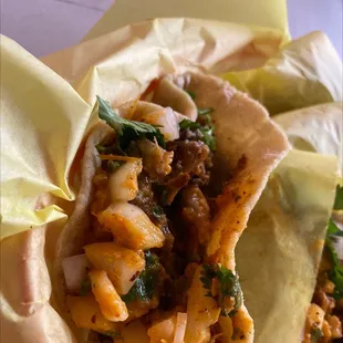 a close up of a taco