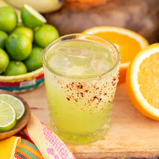 Spicy Skinny Margarita made with jalapeno-agave, fresh lime, and tajin.