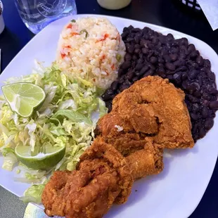 Guatemalan fried chicken with rice and beans
