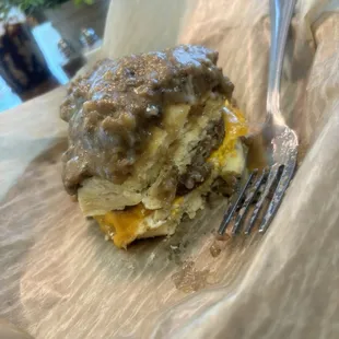 &quot;The Ultimate&quot; sausage egg and cheese breakfast sandwich on buttermilk biscuits loaded with homemade sausage gravy.