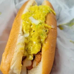 a hot dog with mustard