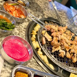 various dishes of food being prepared