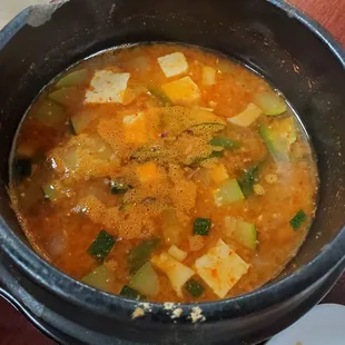 a pot of soup on a table